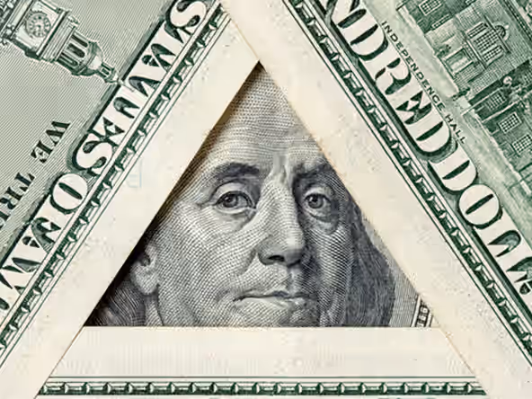 A banknote framed as a pyramid