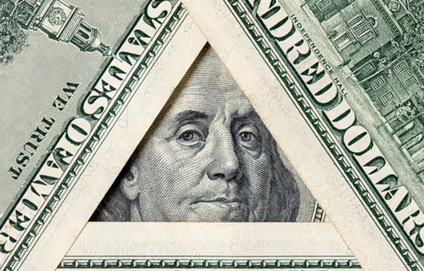 A banknote framed as a pyramid
